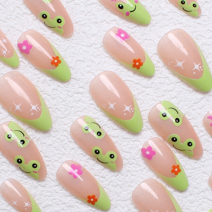 Artificial nail set with creative frog designs and playful accents Stornfield