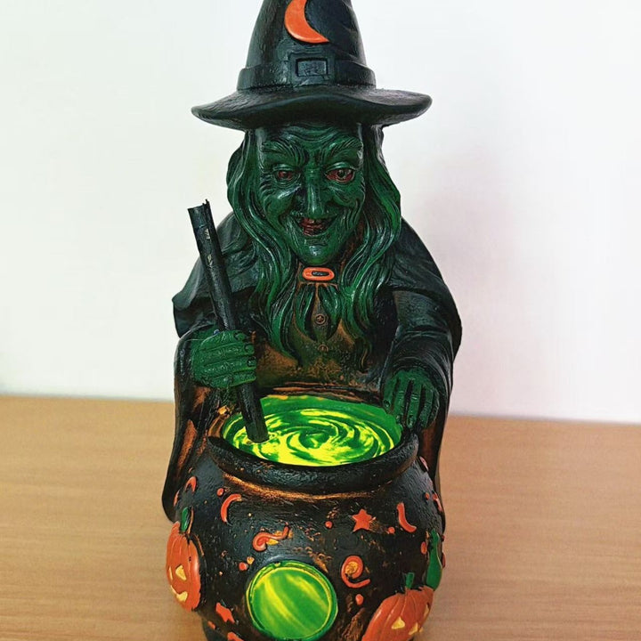 Decorative witch figure with cauldron Stornfield
