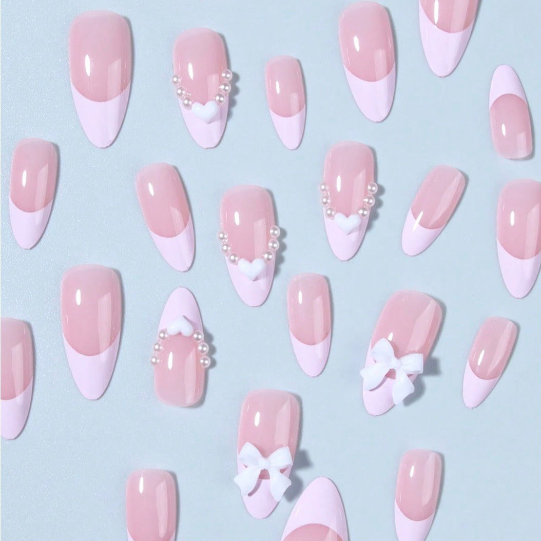 Artificial nail tips with heart and bow decorations Stornfield