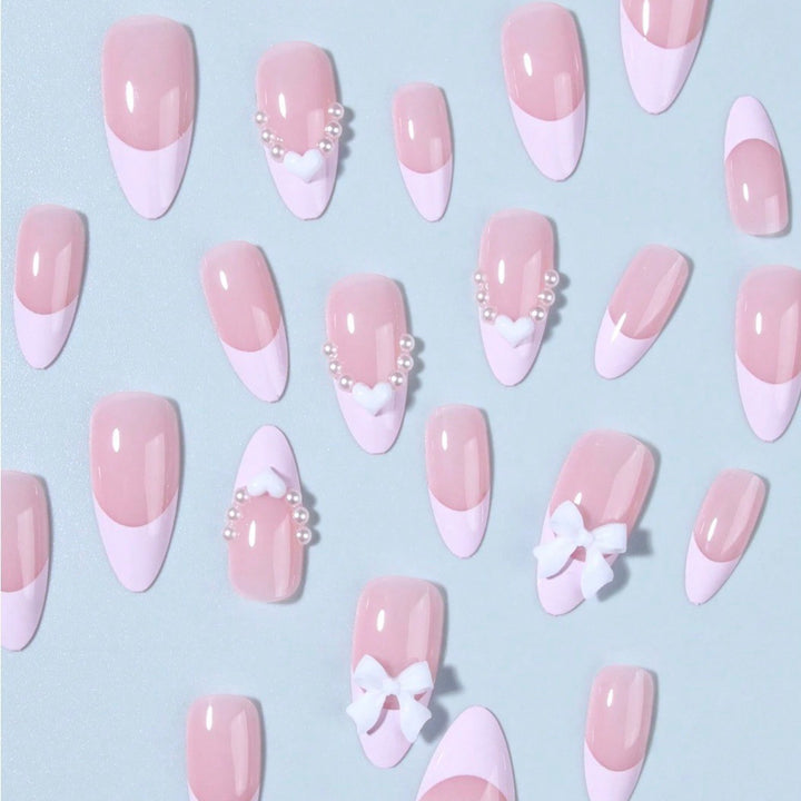 Artificial nail tips with heart and bow decorations Stornfield