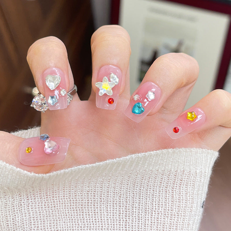 Artistic Nail Extensions with Decorative Elements Stornfield