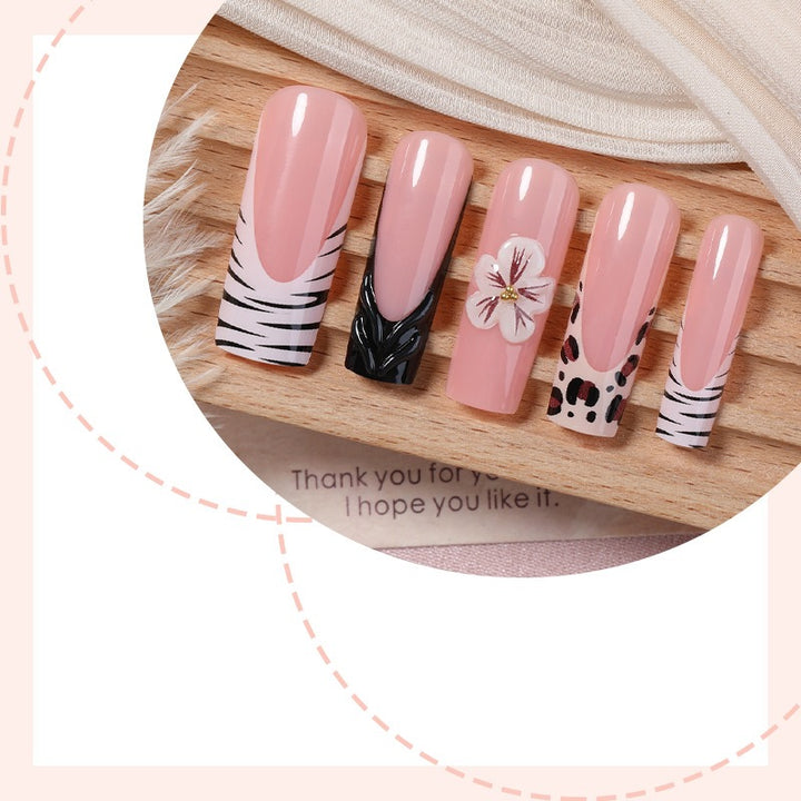 Nail art set with floral and marbled designs Stornfield