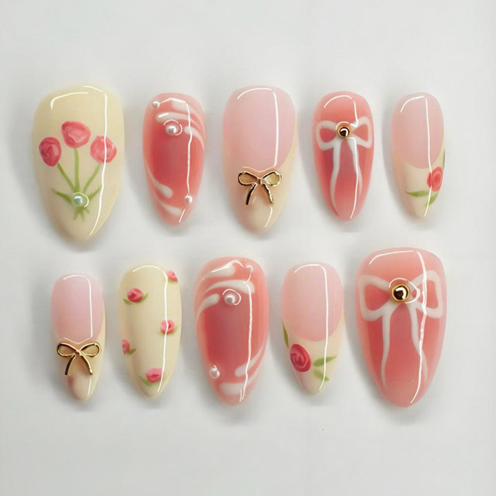 Artificial nail set with floral accents and elegant glitter Stornfield