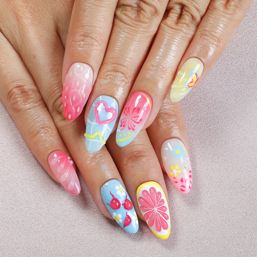 Creative nail art set with playful floral design and glitter effects Stornfield