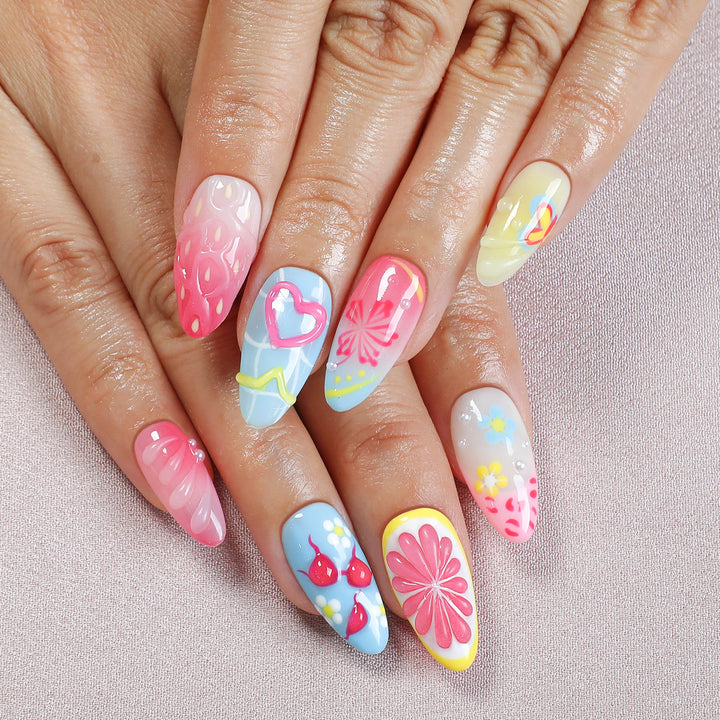 Creative nail art set with playful floral design and glitter effects Stornfield