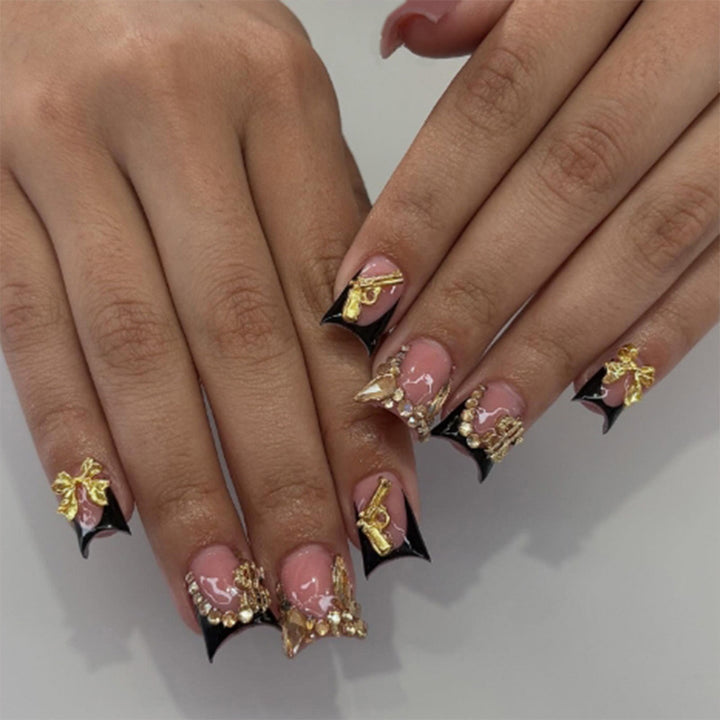 Artificial nail set with luxurious 3D decorations and elegant glitter details Stornfield