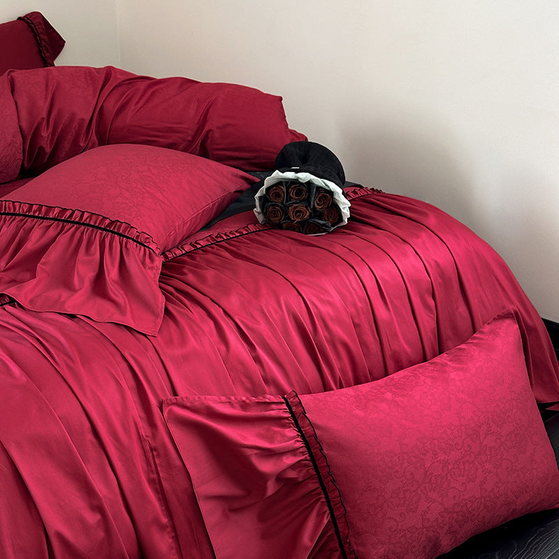 Elegant satin bedding set with pleated detail, jacquard design & ruffle