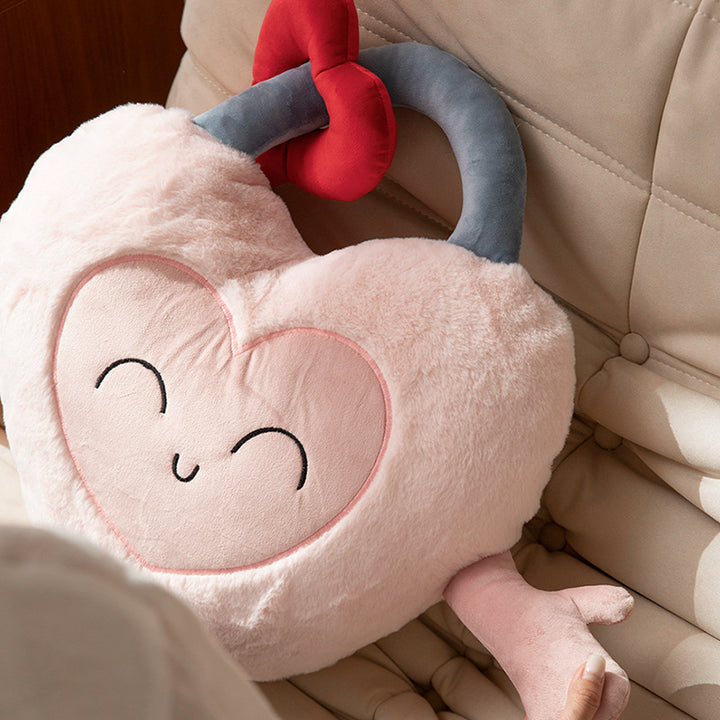 Plush heart cuddle pillow with sewn-on key motif and cute embroidered face Stornfield