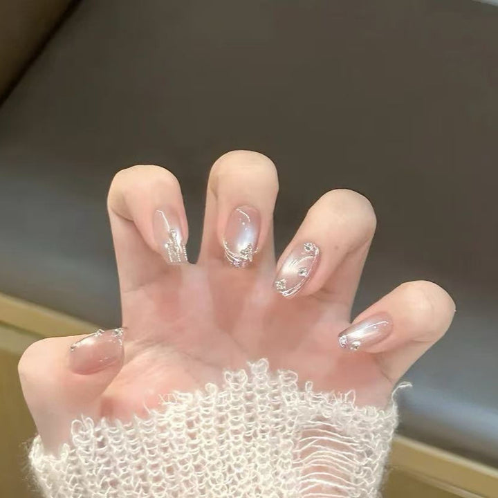 Artificial nails with glamorous rhinestone design Stornfield