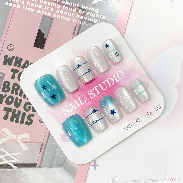 Artistic acrylic nails with star design Stornfield
