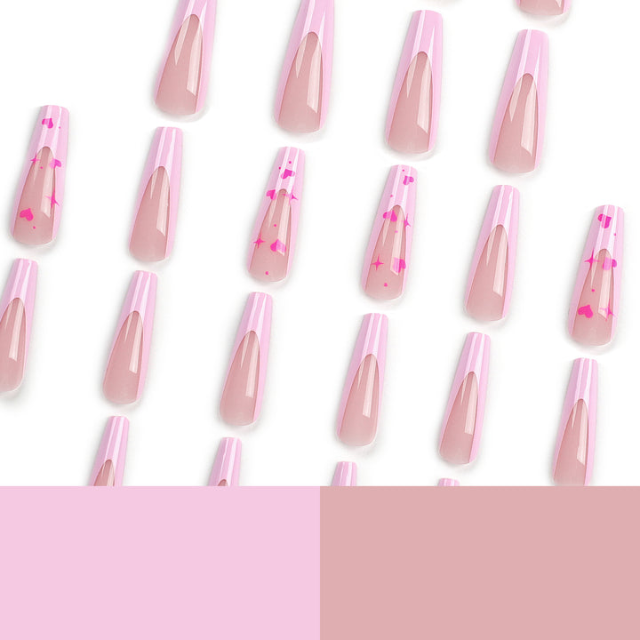 Artful Nail Extensions with Heart-Shaped Accents Stornfield