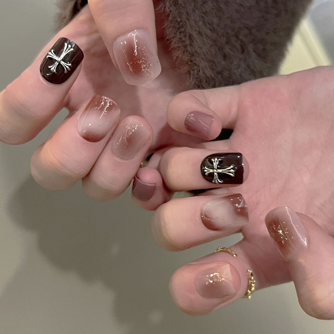 Artful nail extensions with an elegant leaf pattern Stornfield