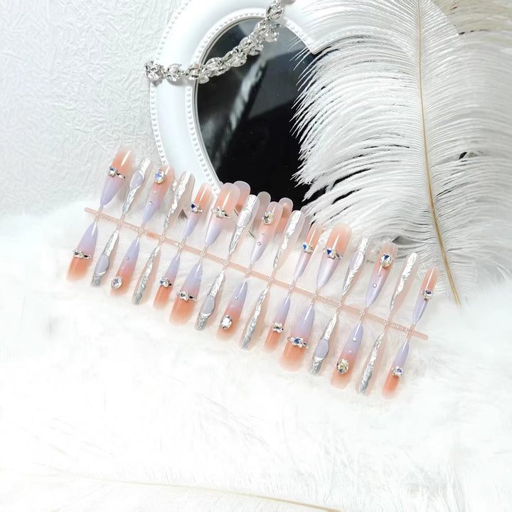 Artificial nails with elegant glitter design and fine 3D decorations Stornfield