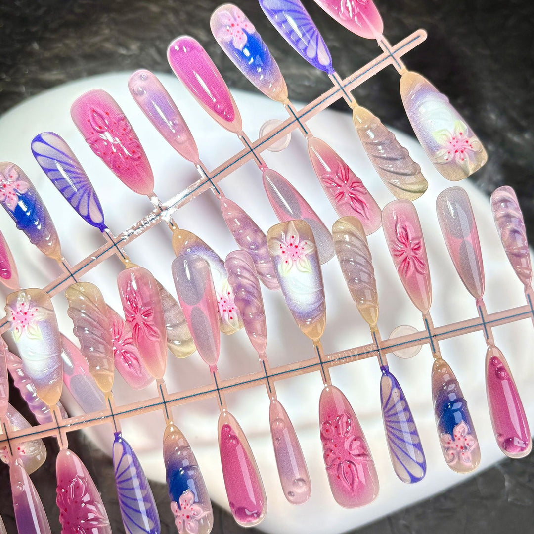 Decorative Press-On Nail Set with Floral and Artistic Designs