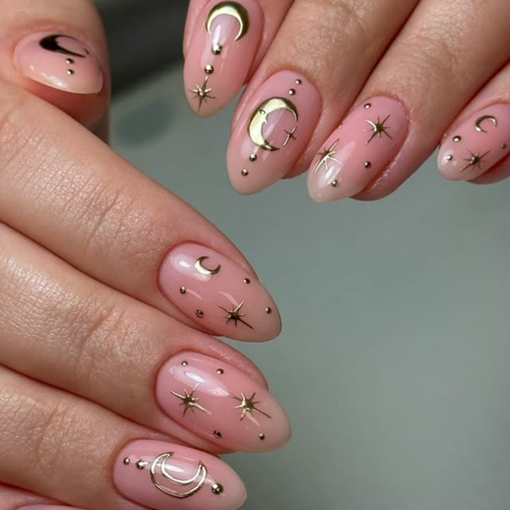 Artful Nail Extensions with Moon-Shaped and Star-Shaped Decorations Stornfield