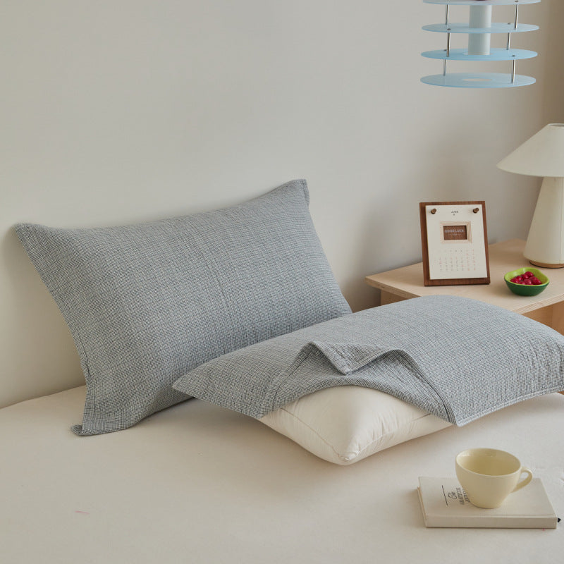 Textured cushion cover set made of cotton-linen blend with waffle structure