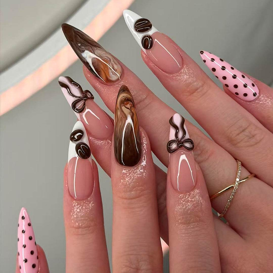 Elegant artificial nails with chocolate motifs and 3D elements Stornfield