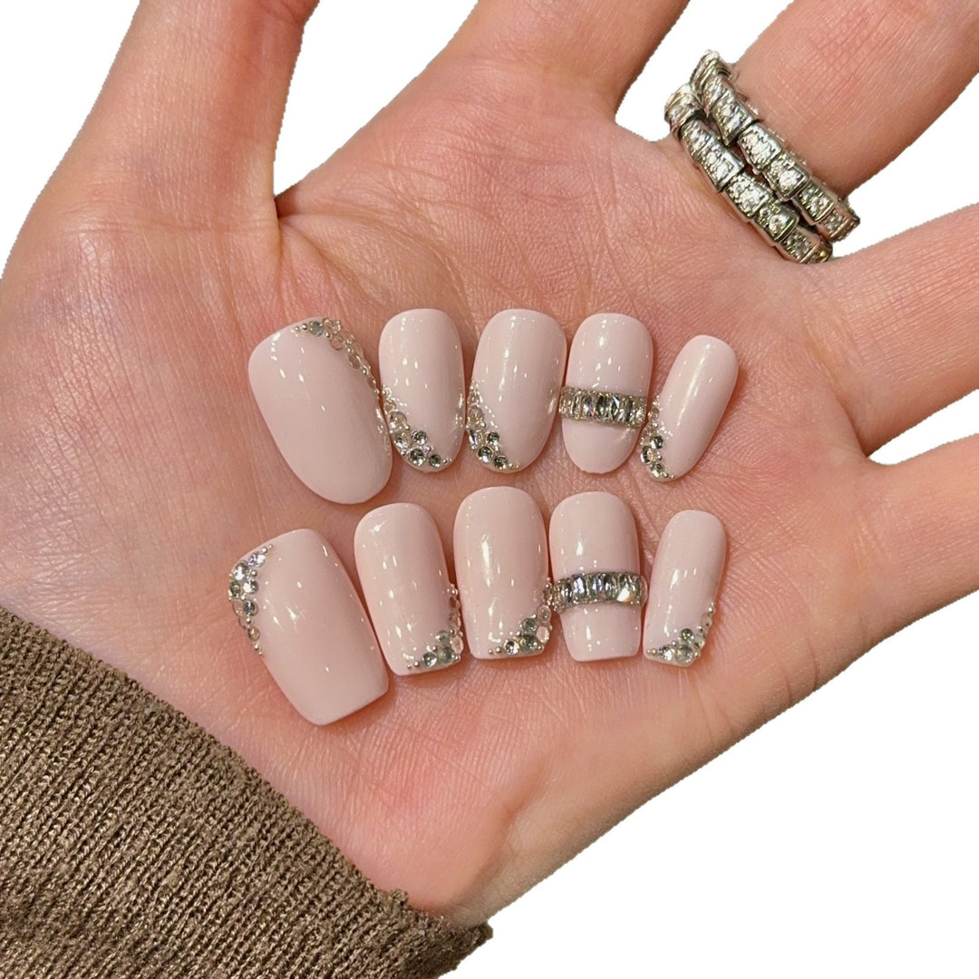 Luxurious art nails with rhinestone accents Stornfield