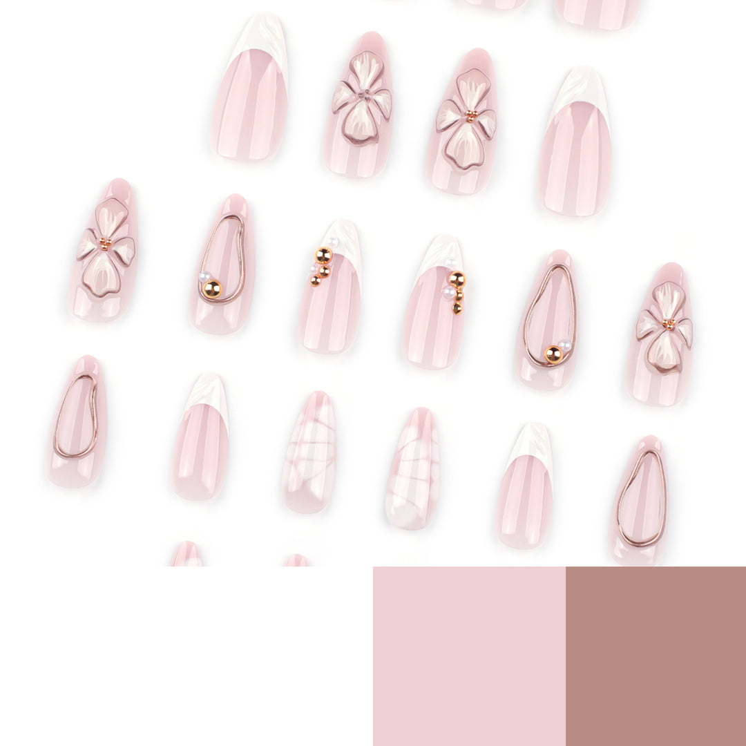 Artful stiletto nails with floral and shimmering decor Stornfield