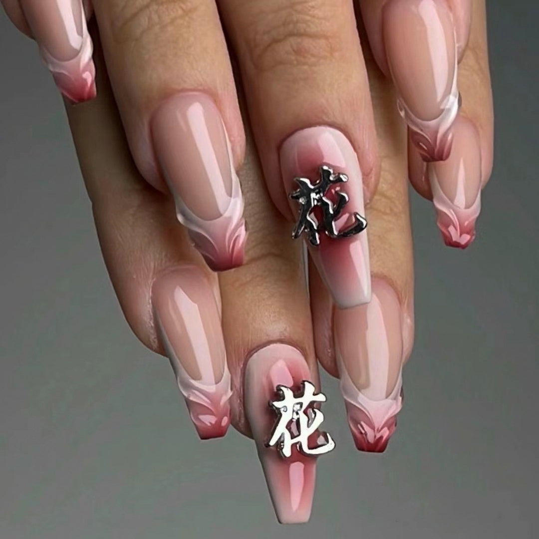 Artful stiletto nails with floral accents and 3D details Stornfield