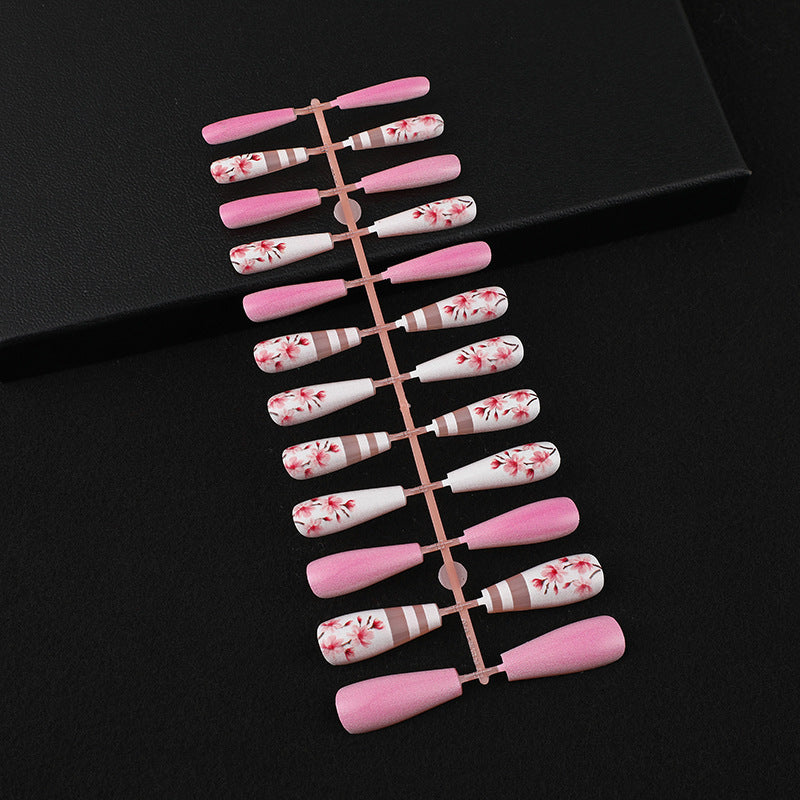 Artificial nails with floral embellishments Stornfield