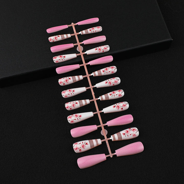 Artificial nails with floral embellishments Stornfield