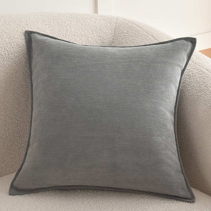 Square decorative cover with fine herringbone pattern and piping edge Stornfield