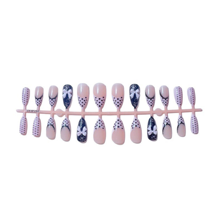 Elegant artificial nails with lace design and bow accents Stornfield