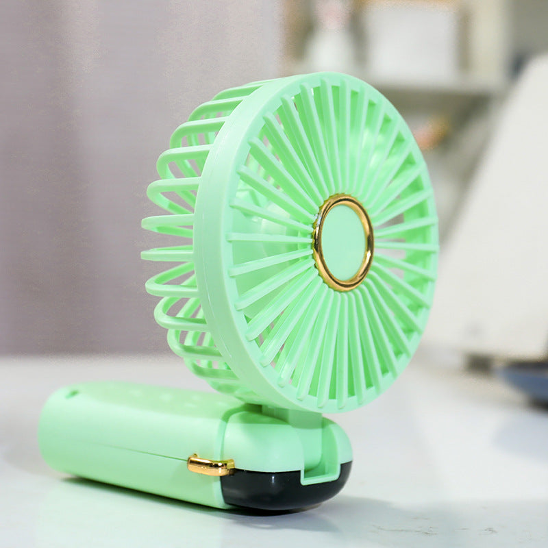 Women's Portable Hand Fan with Integrated Spray Function and USB Charging Option Stornfield