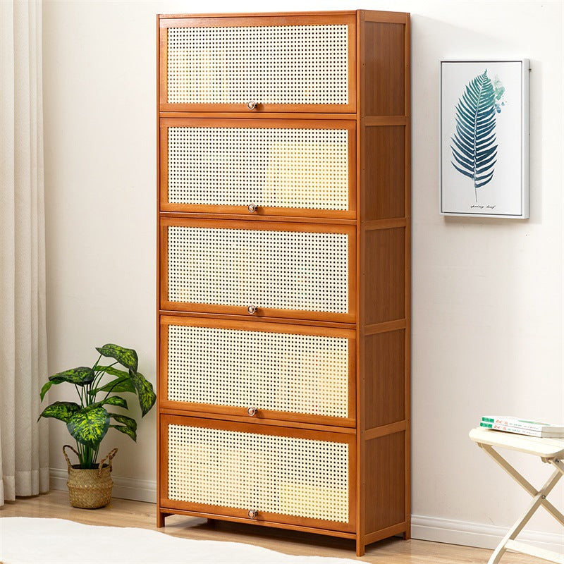 Storage chest with decorative rattan front and functional storage Stornfield
