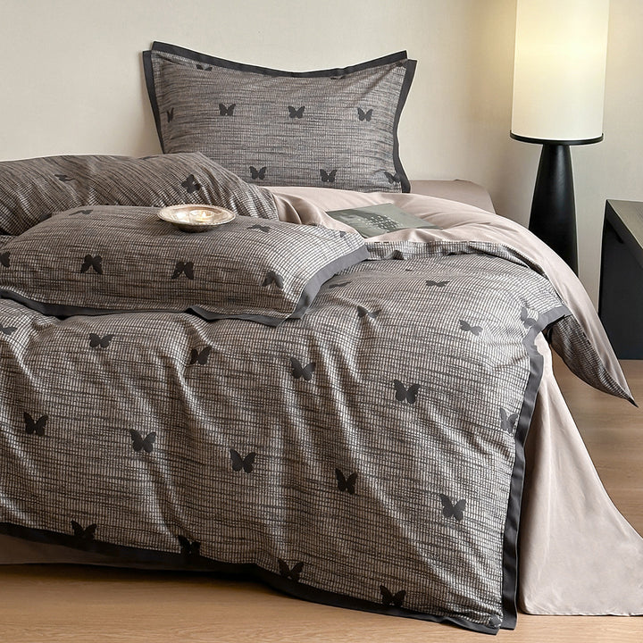Duvet cover set with fine check pattern and subtle floral relief made of cotton blend