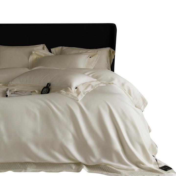 Silky flowing satin bed set with decorative cassette border and extra soft touch