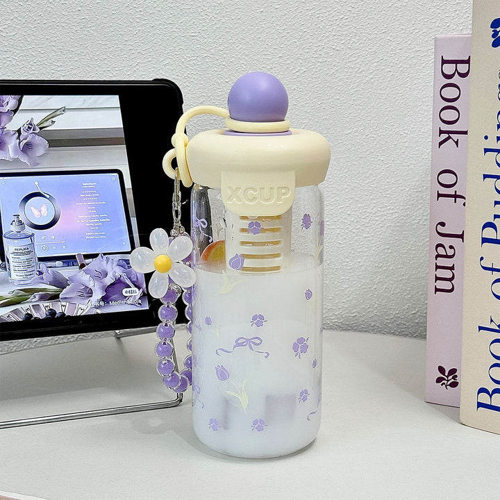 Women's bottle with integrated fruit infuser and Stornfield keychain