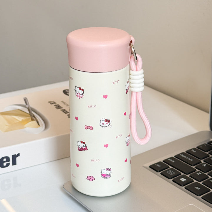 Women’s insulated drinking bottle with practical carrying strap and playful design Stornfield