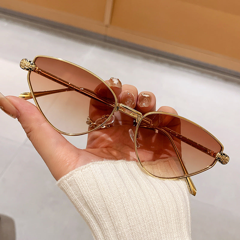 Ladies Designer Sunglasses with Chic Cat Eye Design and Luxurious Frame Stornfield