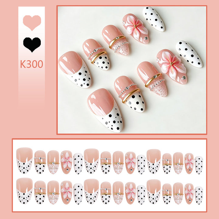 Artificial nail set with elegant flower and dot patterns Stornfield