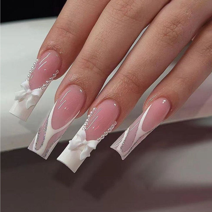 Elegant Fake Nails with Pearl and Bow Decorations Stornfield