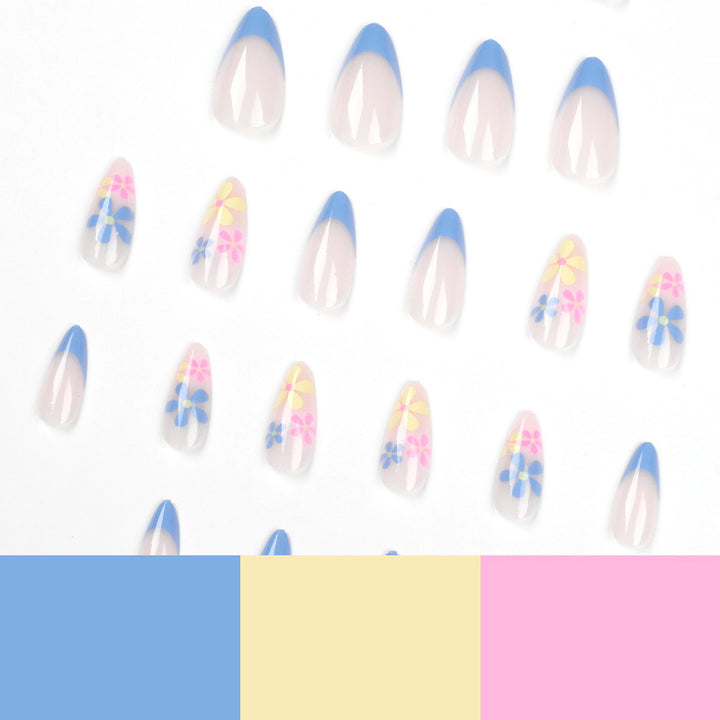 Artificial nail art with floral design and gradient Stornfield