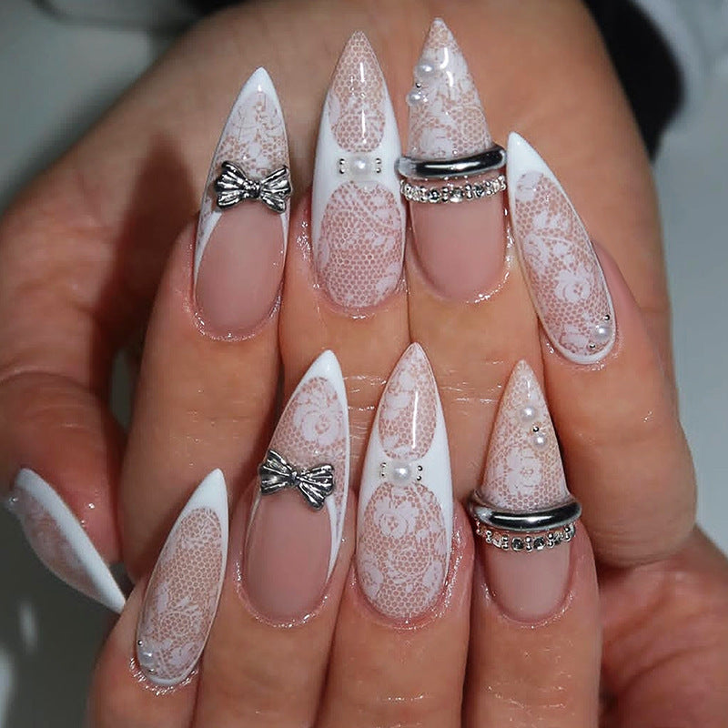 Artificial nail set with romantic floral design and sparkling accents Stornfield