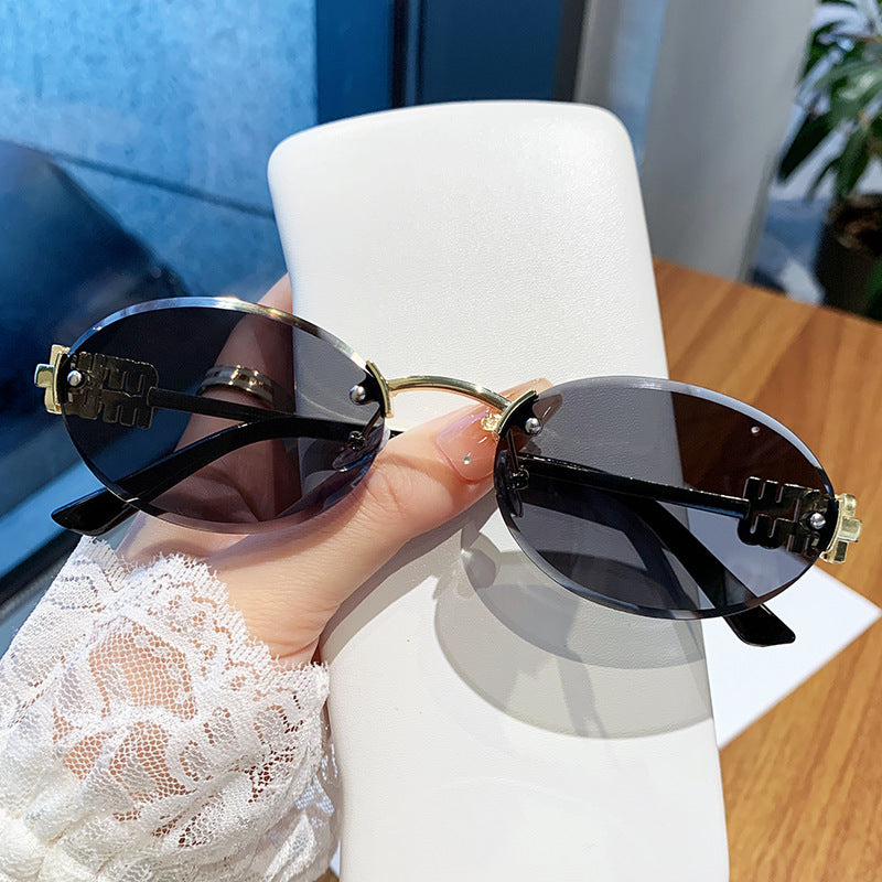 Ladies fashionable sunglasses in elegant oval design Stornfield