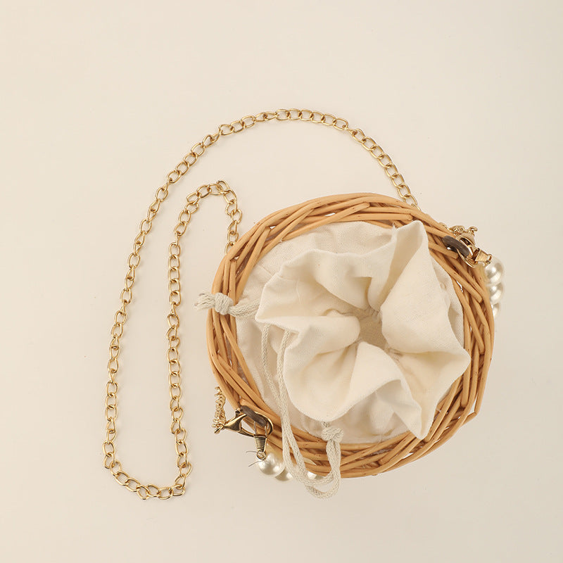 Women's elegant basket bag with pearl chain Stornfield