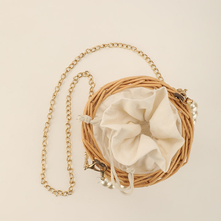 Women's elegant basket bag with pearl chain Stornfield