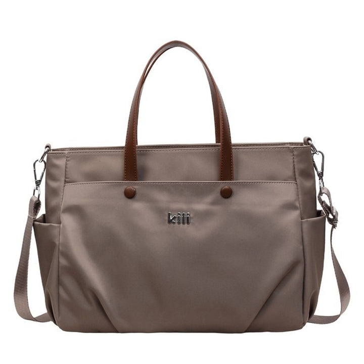 Shopping bag with comfortable carrying system and practical outer pockets Stornfield