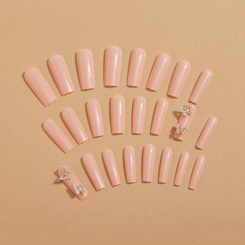 Artificial nails with butterfly accents and rhinestone decorations Stornfield