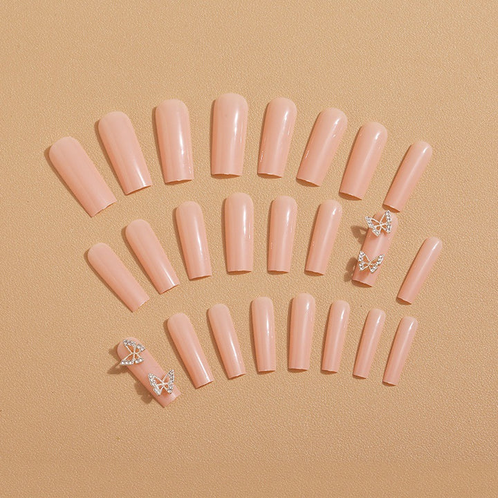 Artificial nails with butterfly accents and rhinestone decorations Stornfield