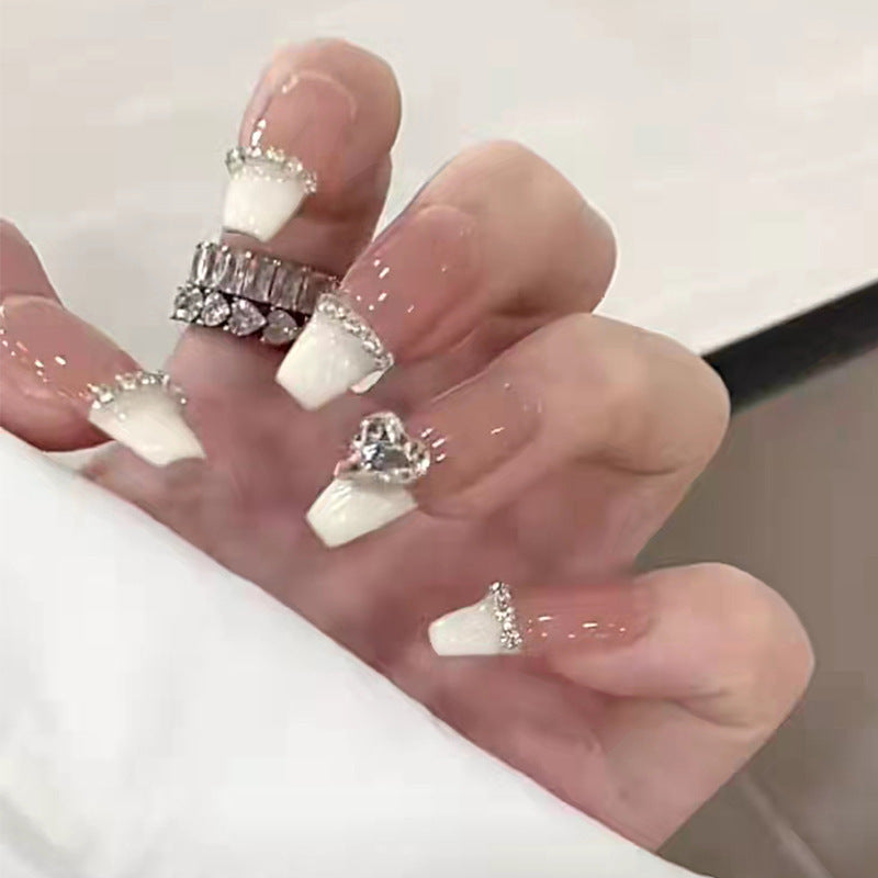 Glamorous artificial nails with rhinestones and elegant contours Stornfield