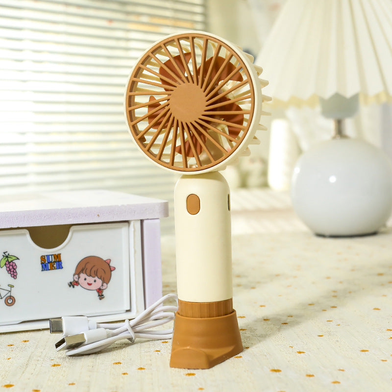 Women's Portable Mini Fan with Ergonomic Grip and USB Charging Function Stornfield