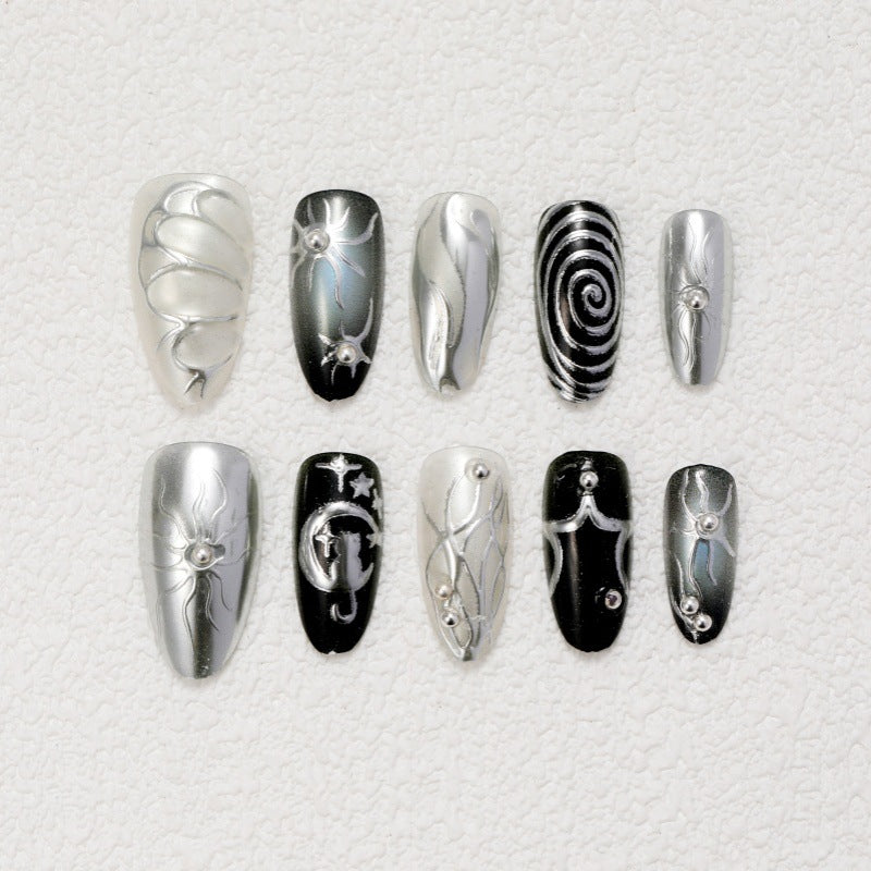 Artificial nails with metallic effects and complex designs Stornfield