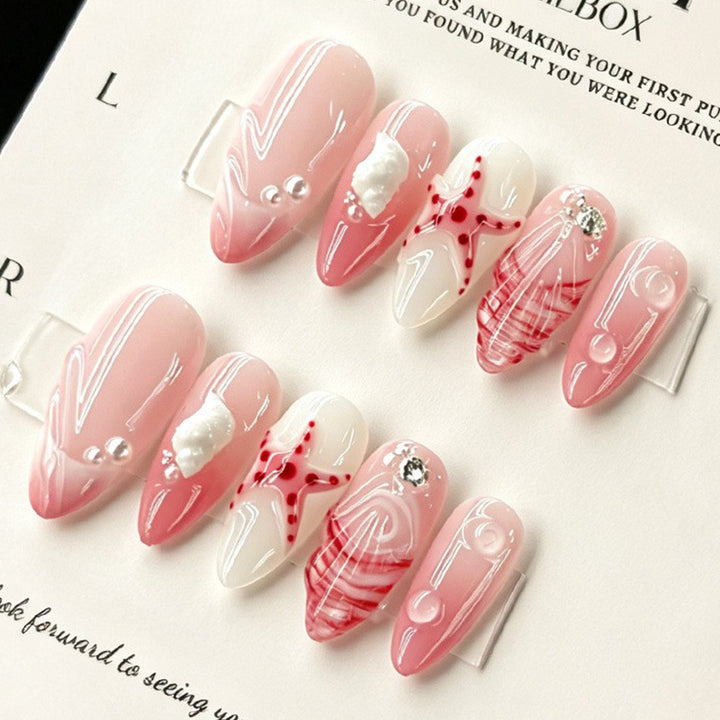 Artificial nails in maritime style with starfish motifs Stornfield