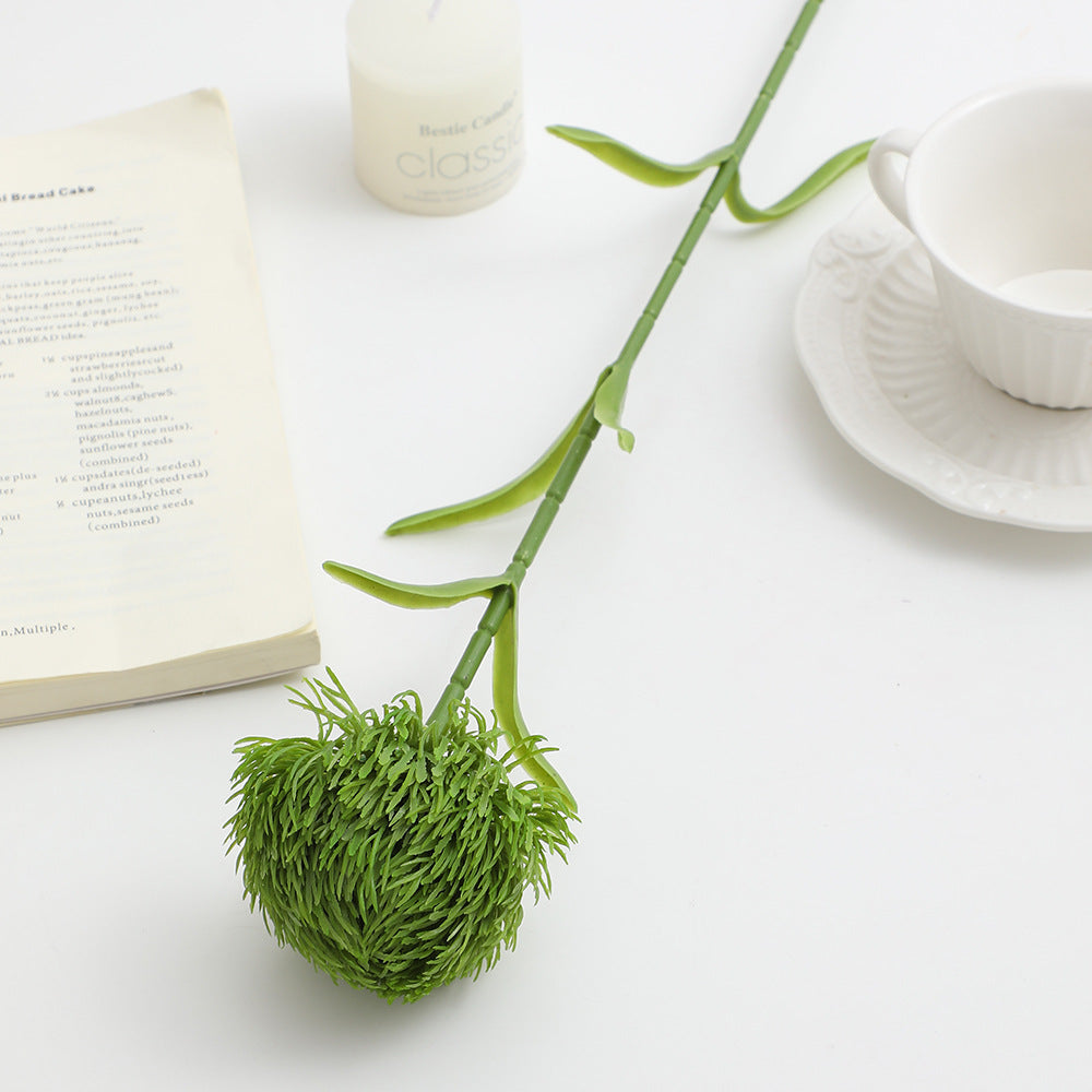 Decorative artificial flower branch with a natural appearance